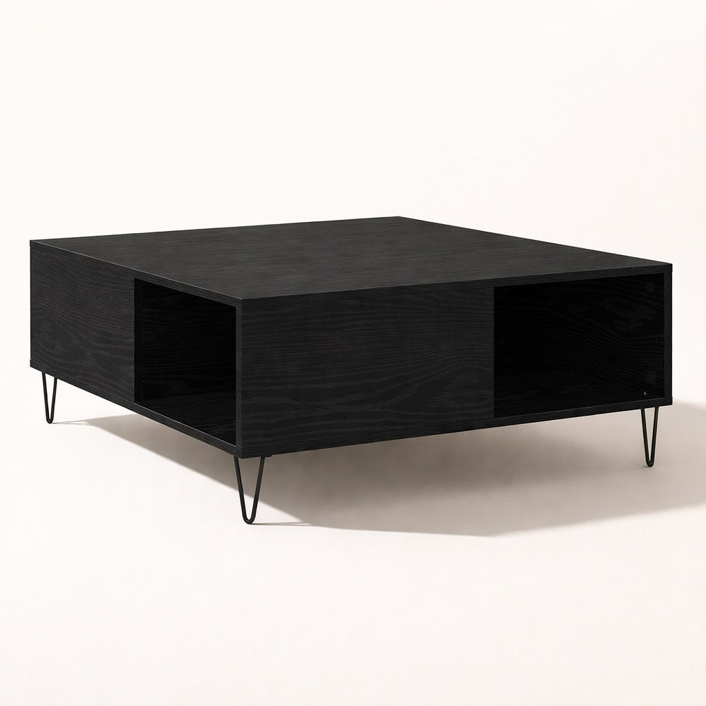 Table basse avec rangement noire au design graphique, parfaite comme table basse de salon moderne et structurée.
