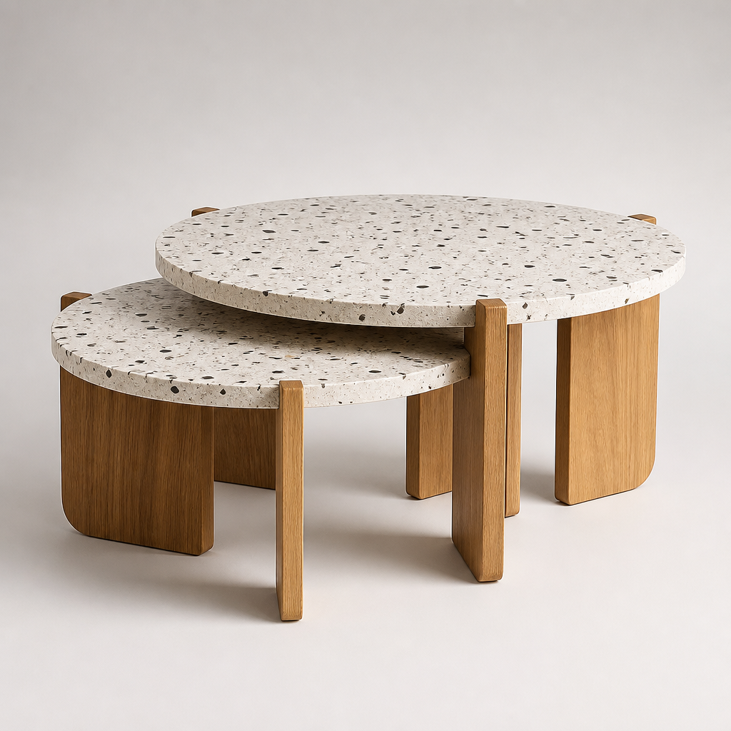 Tables basses gigognes Calyra Duo avec plateaux effet terrazzo et pietements en bois clair, sur fond neutre