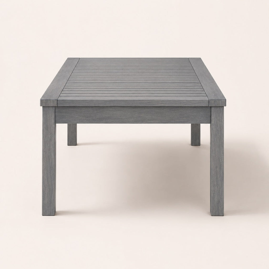 Vue de face d’une table basse d’extérieur rectangulaire grise design moderne pour terrasse