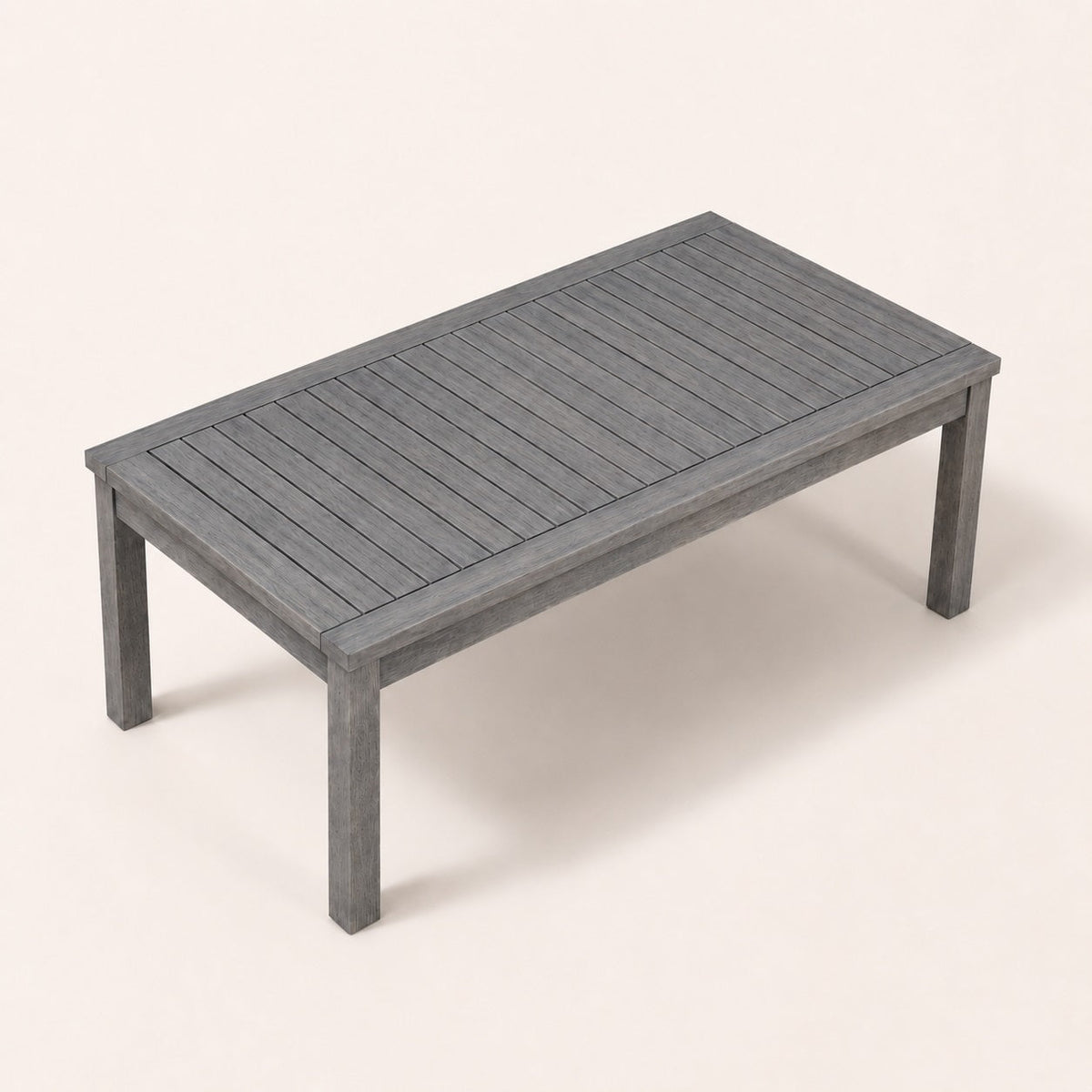 Table basse de jardin vue plongeante avec plateau à lattes grises pour extérieur moderne